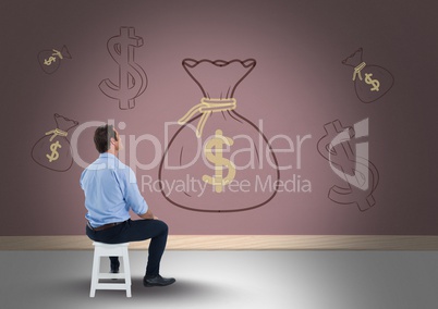 man in front of money on wall