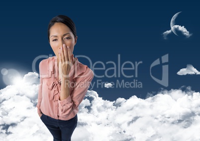 Woman yawning in clouds with moon