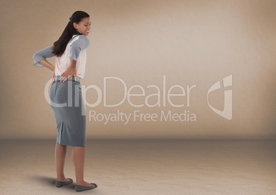 Businesswoman with sore back in room
