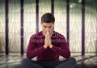 Man meditating in meditation room