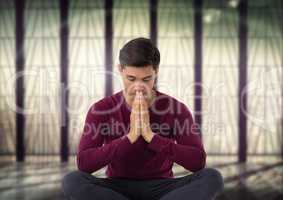 Man meditating in meditation room