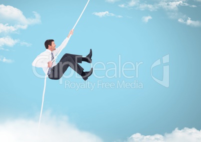 Man swinging on rope