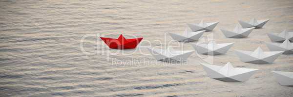 Composite image of digital composite image of paper boats
