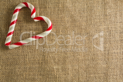 Heart shaped candy cane on on fabric