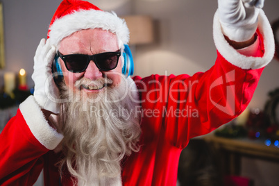 Santa claus playing a dj