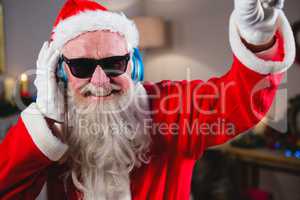 Santa claus playing a dj