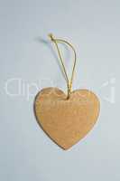 Close up of heart shape decoration with thread