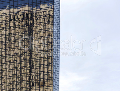 building reflected on glass windows