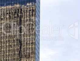 building reflected on glass windows