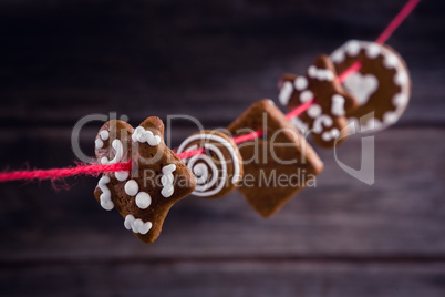 Various christmas cookies arranged in thread