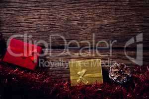 Christmas decoration and gift boxes on wooden table