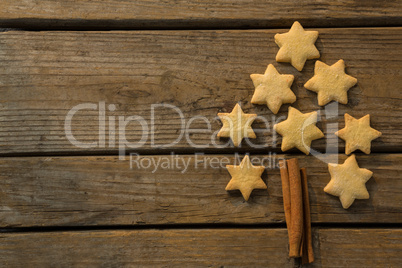 Christmas tree made with star shape cookie and cinnamon stick