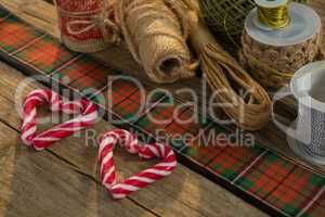 Close up of thread spools with candy cane