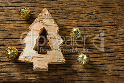 Close up of Christmas tree decoration with golden balls
