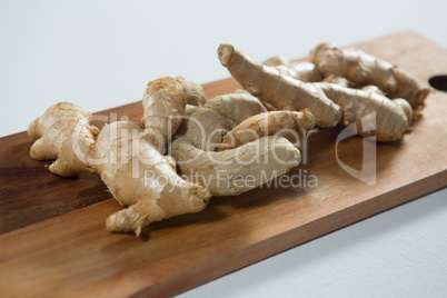 Close up of fresh gingers on serving board