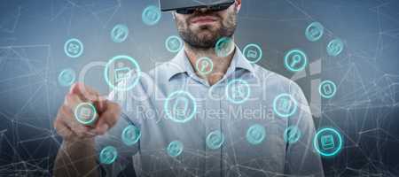 Composite image of man pointing while using black oculus rift headset