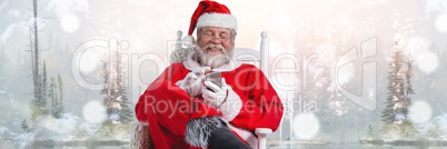 Santa with Winter landscape using phone