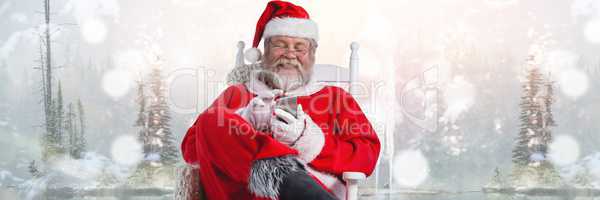 Santa with Winter landscape using phone