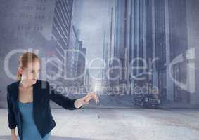 Businesswoman touching sky in tall city