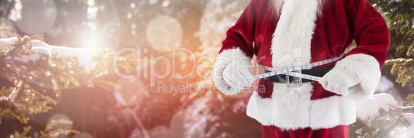 Santa with Winter landscape measuring his waist