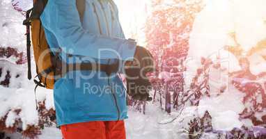 Man standing  in snow Forrest