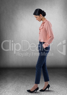 Stylish Businesswoman  posing looking down at foot