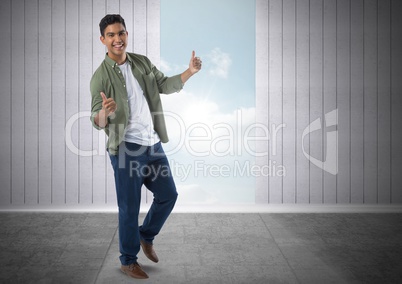 Businessman giving thumbs up with sky opening