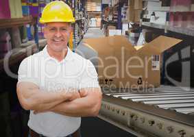 man with boxes on conveyor belt in warehouse