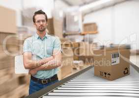 man with boxes on conveyor belt in warehouse