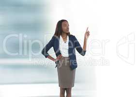 Businesswoman pointing up