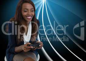 Businesswoman playing with computer game controller