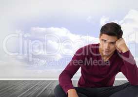 Businessman disappointed and gloomy sitting with clouds