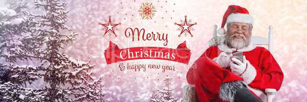 Merry Christmas Happy New year text and Santa Claus in Winter with phone
