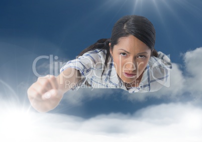 Businesswoman flying in clouds
