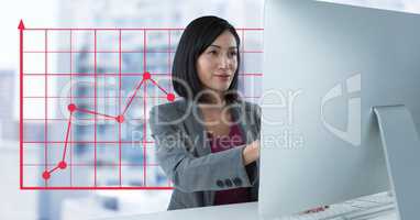 Businesswoman at desk with computer and grid points line