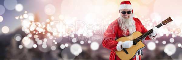 Santa with Winter landscape with guitar and sunglasses