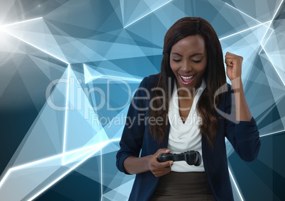 Businesswoman playing with computer game controller with polygons background