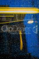 Raindrops on train window.