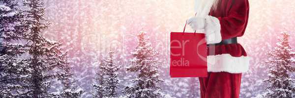 Santa Claus in Winter with shopping bag