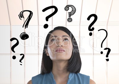 woman looking up at question mark