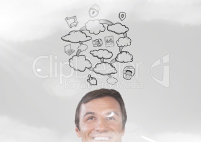 man looking up at clouds