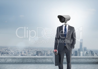 Businessman with CCTV head with city skyline