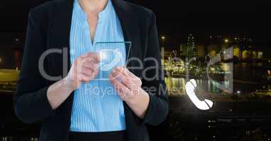 woman holding glass interface, phone icon
