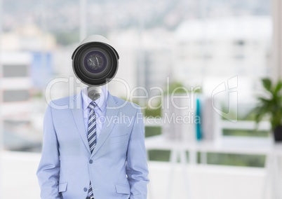 Businessman with CCTV head at office