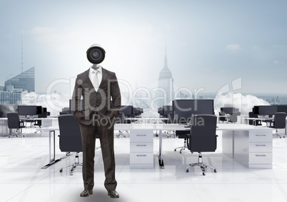 Businessman with CCTV head in office above city skyline