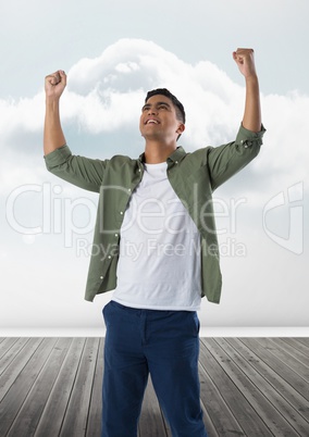 Businessman celebrating success with cloud in room