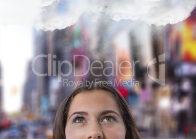 woman looking up at  cloud