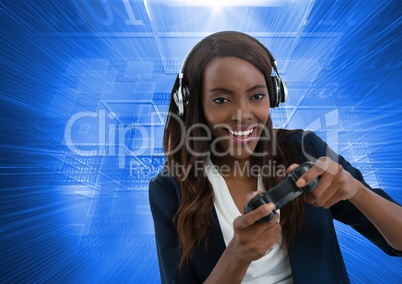 Businesswoman playing with computer game controller with blue motion background