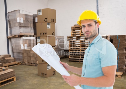 man with boxes in warehouse