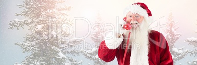 Santa Claus in Winter with phone